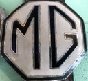 MG