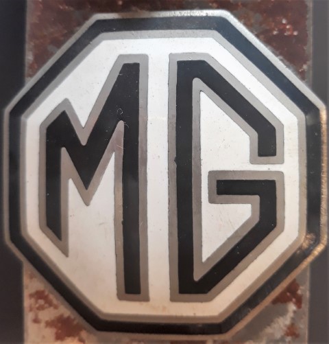 MG