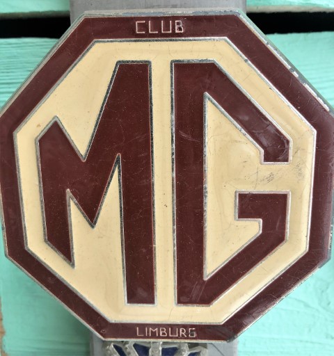 MG